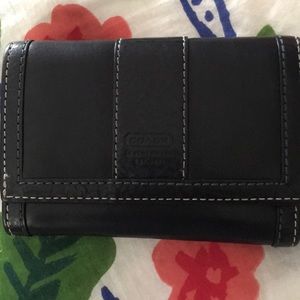 New black leather coach wallet